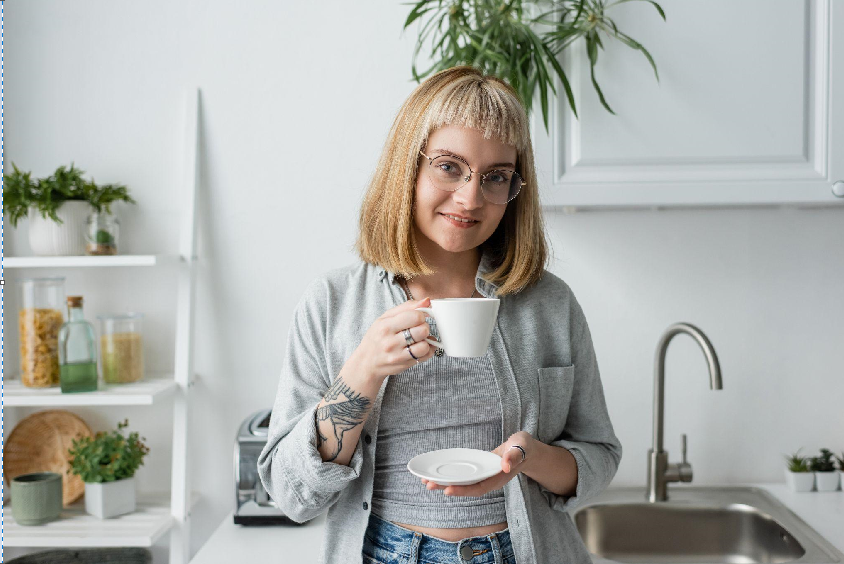 A woman with stylish micro bangs, perfectly framing her face for a bold and trendy look.